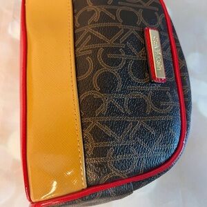 Calvin Klein Yellow and Black Patterned makeup Bag